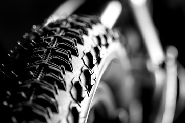 Bicycle wheel and tire close up on tread abstract