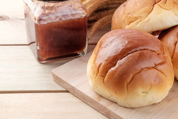 Butter roll on wooden background