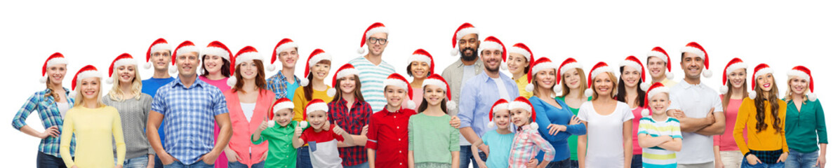 Fototapeta premium group of happy people in santa hats