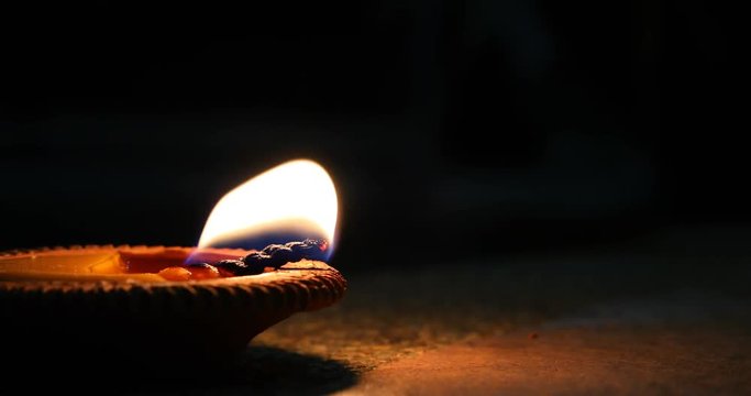 candle light flame fire on black background, traditional festival of Loi Krathong, Yee Peng Lanna Chiangmai, Thailand