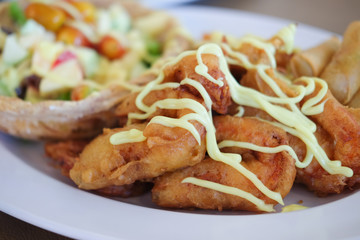 Fruit salad with fried shrimp