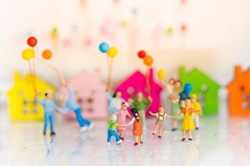 Miniature family using as background International day of families concept.