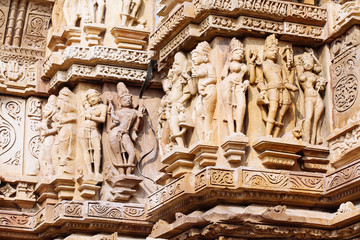 Ancient bas-relief at famous erotic temple in Khajuraho, India.