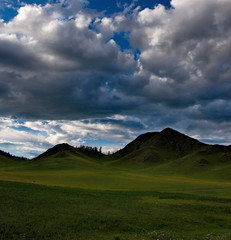 Sunset in the steppes of the Altai mountains