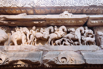 Ancient bas-relief at famous erotic temple in Khajuraho, India.