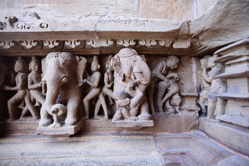 Ancient bas-relief at famous erotic temple in Khajuraho, India.