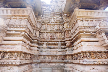Ancient bas-relief at famous erotic temple in Khajuraho, India.