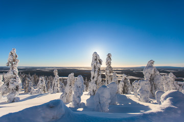 Beautiful cold mountain view of ski resort, sunny winter day with slope, piste and ski lift