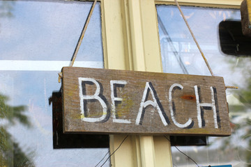 Beach sign in window