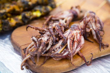 Barbeque seafood, grilled octopus at a street market