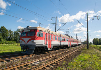 Fototapeta na wymiar Electric locomotive with a passenger train 
