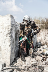 Post apocalyptic survivor creature with homemade weapons