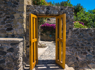 A summer day visiting Aragonese Castle and looking toward Capri and Vesuvi Ischia Ponte, Ischia,...