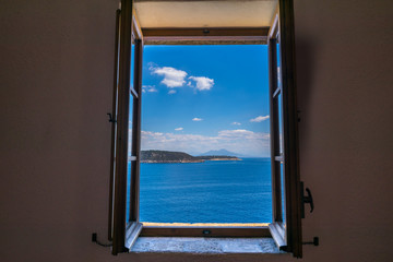 A summer day visiting Aragonese Castle and looking toward Capri and Vesuvius, Ischia Ponte, Ischia,...