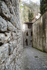 Fototapeta premium Gubbio, Perugia, Italy - small typical street of the Gubbio village.