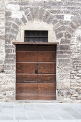 Gubbio, Perugia, Italy -  entrance door, architectural details of the ancient palaces