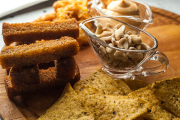 Peanuts, croutons and other snacks for alcohol