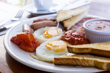 Egg and Toast - classical english breakfast with egg and ham
