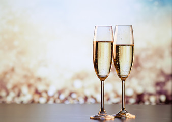 two champagne glasses ready to bring in the New Year