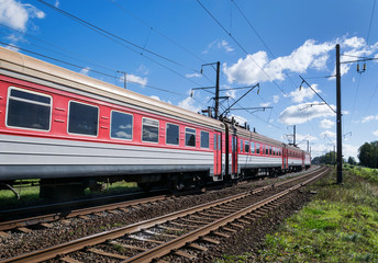 Fototapeta na wymiar Electric locomotive with a passenger train 