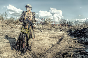 Post apocalyptic survivor creature with homemade weapons - obrazy, fototapety, plakaty