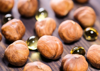 Hazelnut and capsules of vitamin E