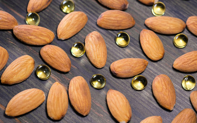 Almond and capsules with vitamin