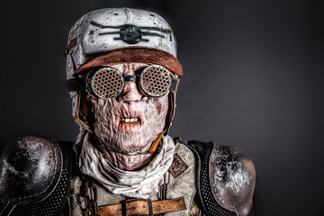 Post apocalyptic survivor masked ugly face. Skin burned by atomic flame