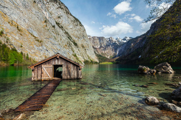 Boat shed on Obersee lake. Bavaria, Germany