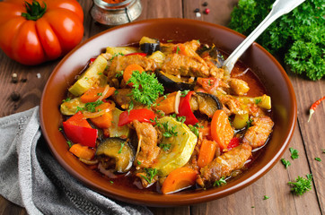 Meat stew with with eggplant, carrots, onions, peppers and zucchini