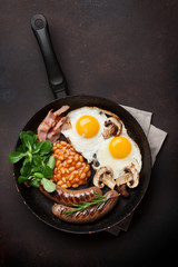 English breakfast. Fried eggs, sausages, bacon