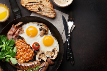 English breakfast. Fried eggs, sausages, bacon