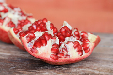 Fresh pomegranate on wooden table