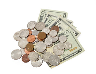 Horizontal shot of fanned out five and twenty dollar bills with a pile of coins on top of them.  White background.