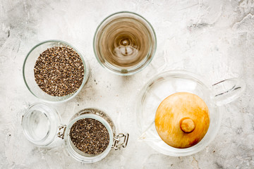 Soak chia seeds in water. Grey background top view