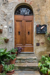 Fototapeta na wymiar Massive wooden doors typical of southern Italy