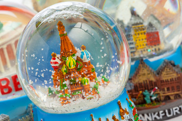 Snow globe travel souvenier destination isolated on white background