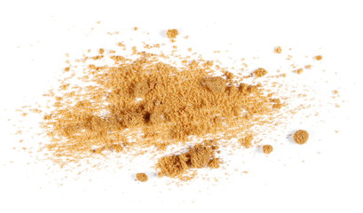 Unrefined brown cane sugar pile isolated on white background