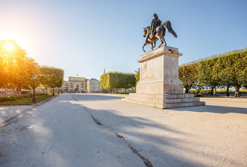 View on the beautiful Peyrou promenade with Louis statue in Montpellier city during the morning light in southern France - obrazy, fototapety, plakaty