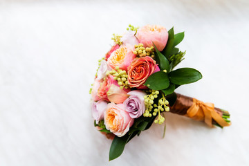 Beautiful bridal bouquet of vibrant pink roses