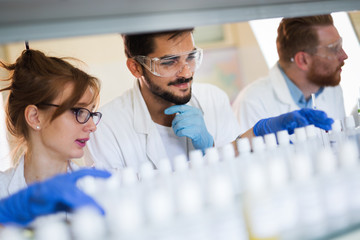 Group of chemistry students working in laboratory