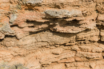 Geological sediments. Natural stone background.