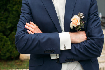 Boutonniere on the lapel of the groom
