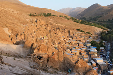 Panoramic view on houses in rocks in a valley in Candovan town in Iran. Looks like Turkish region of Cappadocia.