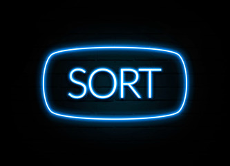Sort  - colorful Neon Sign on brickwall