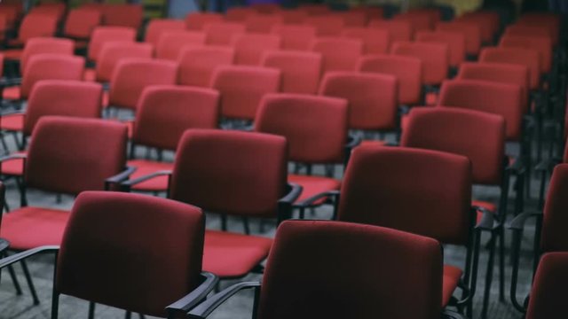 conference hall cinema theater empty red seats front view chairs stool seating sitting place audience indoors nobody seminar lecture university education public space contemporary auditorium interior