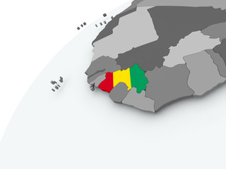 Flag of Guinea on grey globe