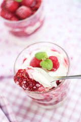Dessert with raspberries and cream