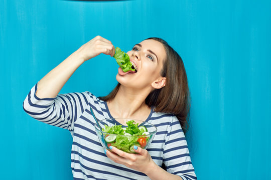 Beautiful Woman Eating Healthy Food Green Salad.