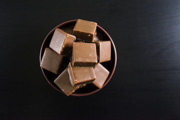 chocolate dessert on black background